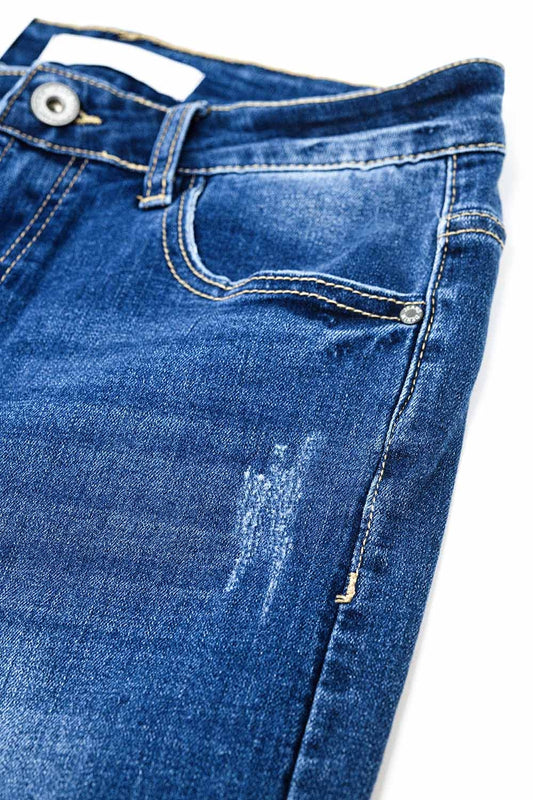 Super skinny jeans in medium wash with rips at the bottom - Denim