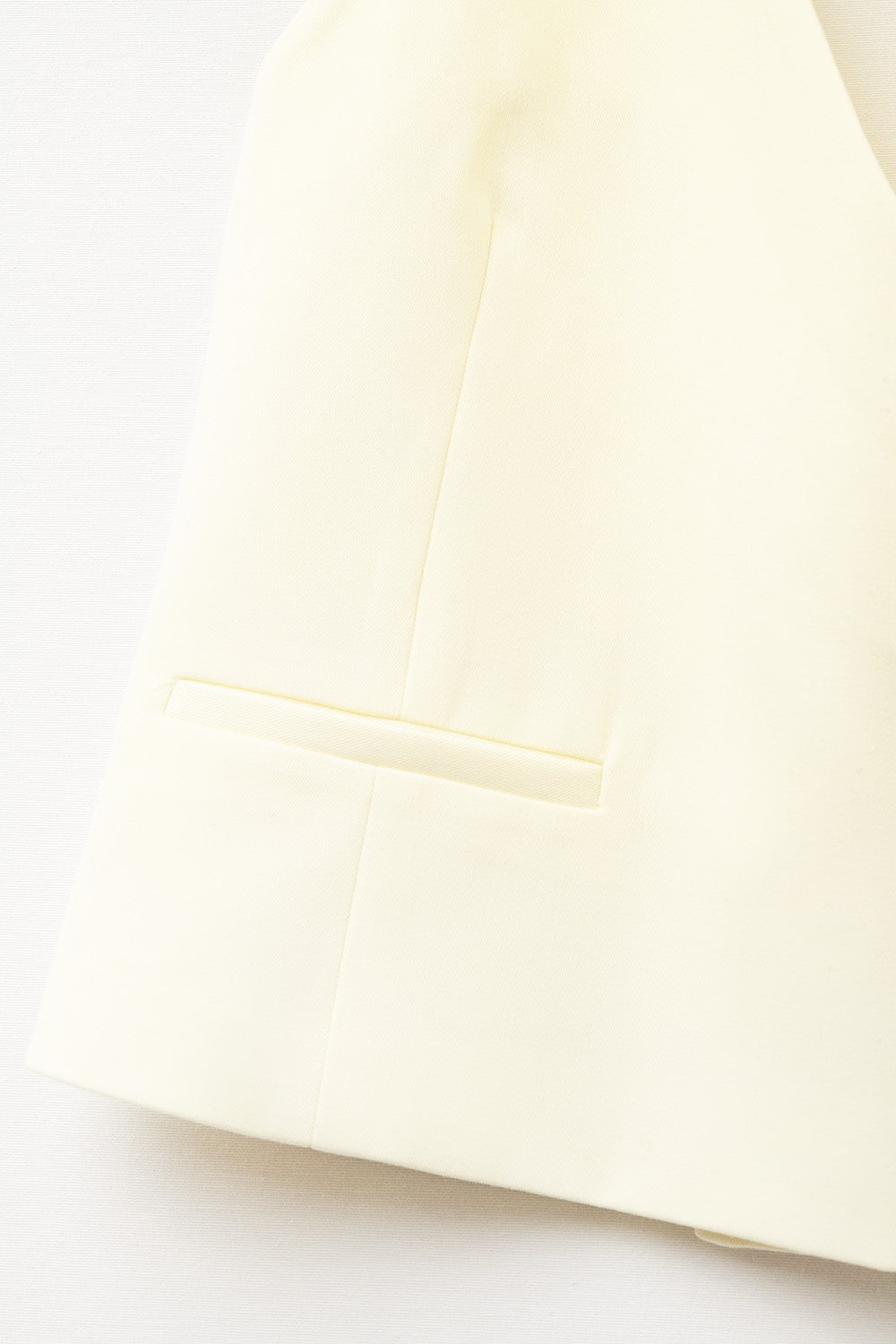 Yellow wrap vest with detailed gold button