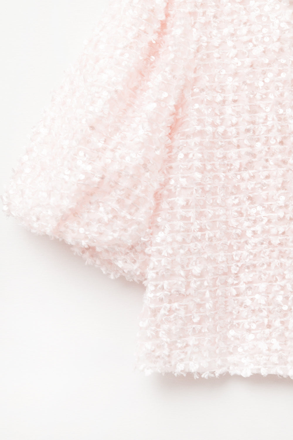 Pink top with sequin detail and balloon sleeves