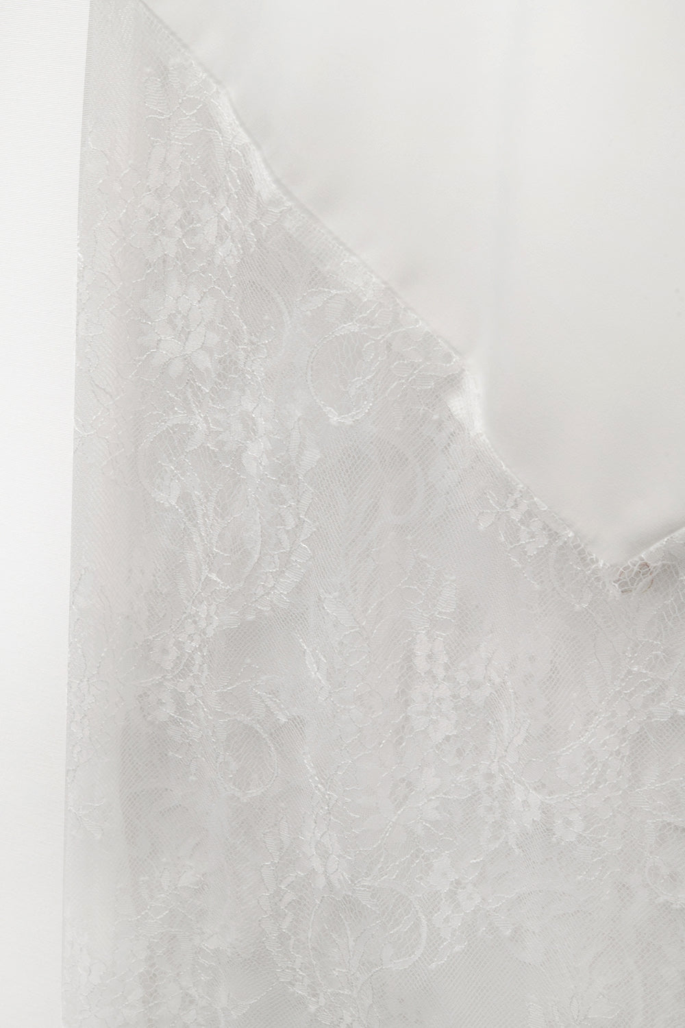 white satin skirt with lace at the bottom