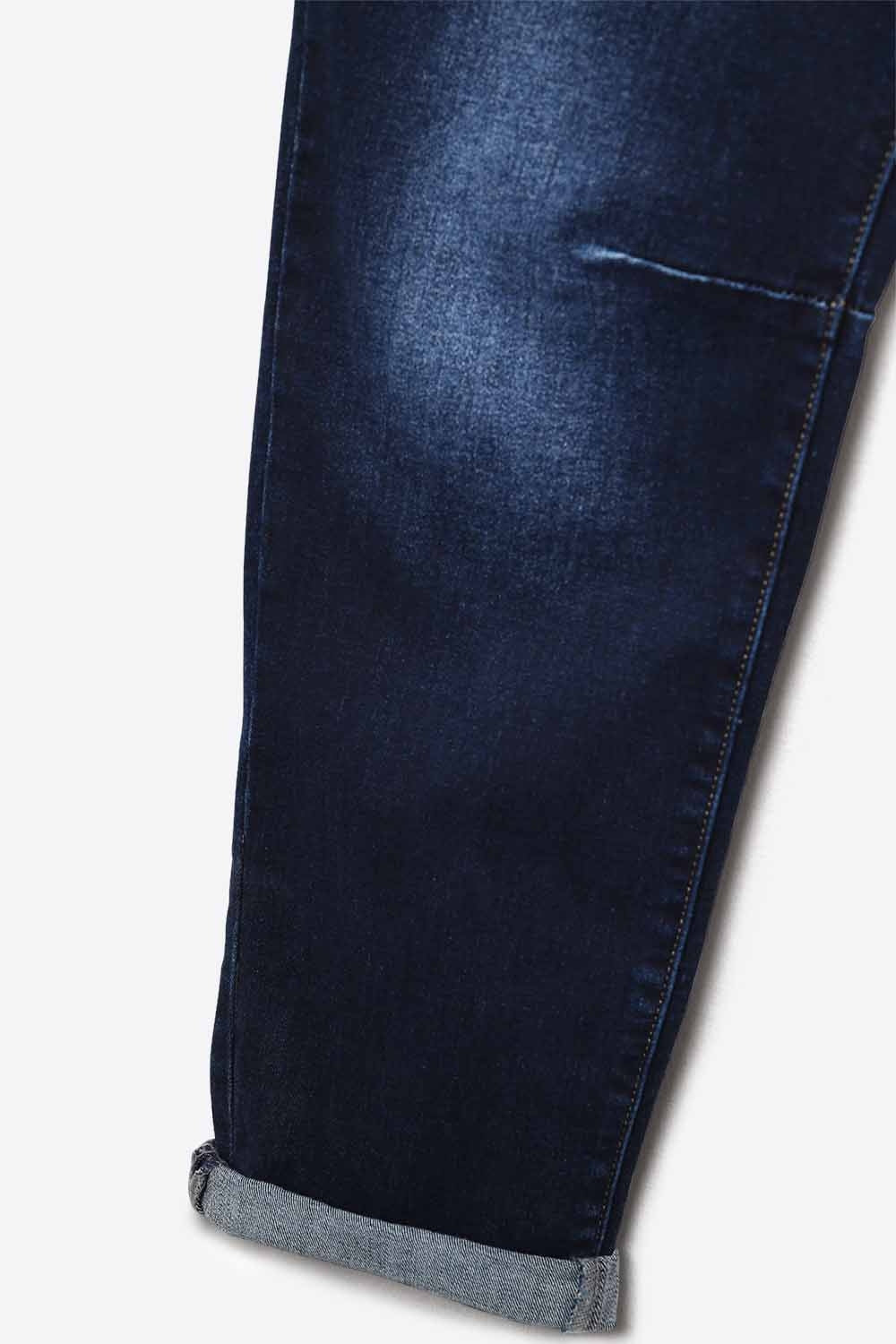 Dark wash jeans with contrast stitching and cuffed hems - Denim