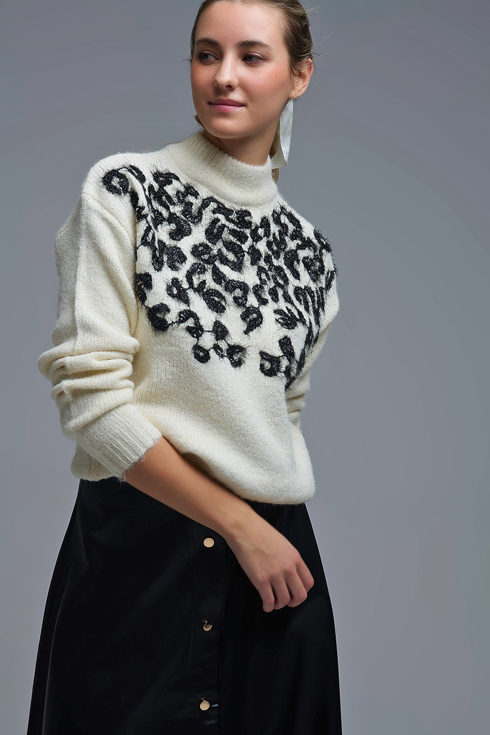 White Knitted Sweater with Abstract Design