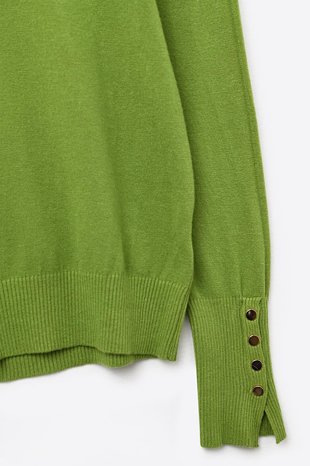 Olive green turtleneck sweater with gold buttons on the cuff