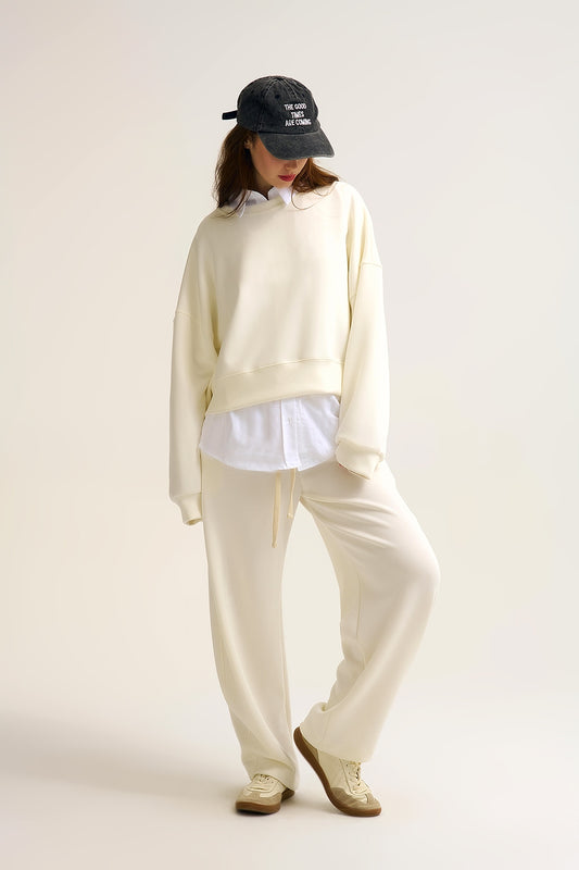 Crew Neck Dropped Shoulder Basic Sweatshirt in Cream