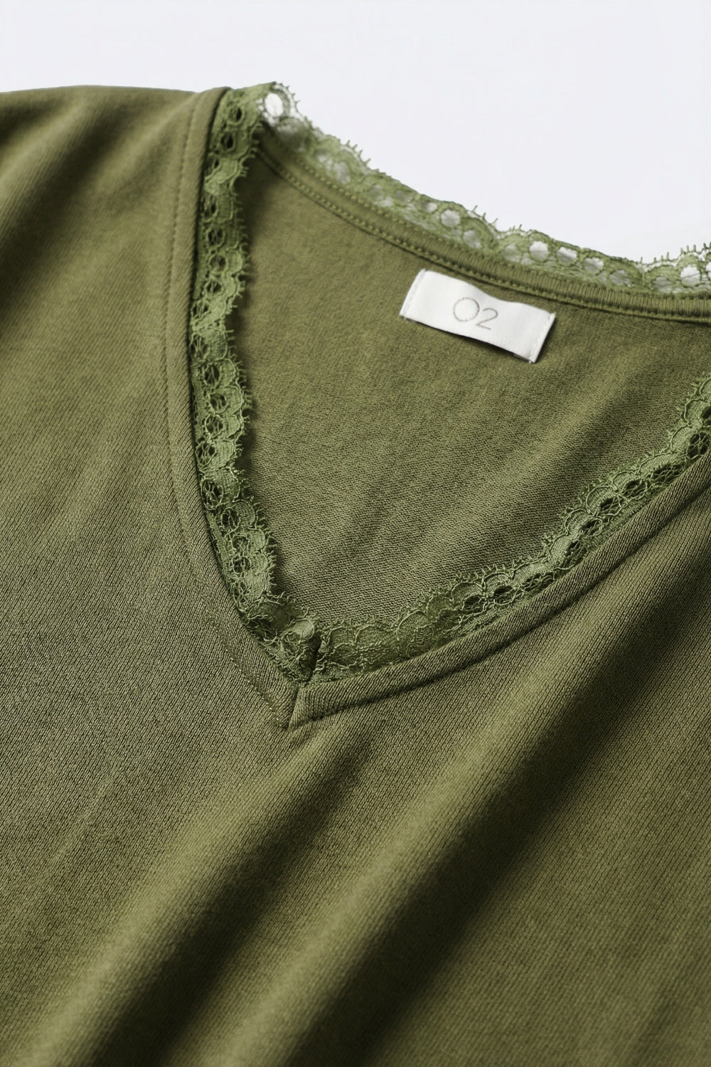 Fine and soft knit sweater with V-neck and lace trim in khaki