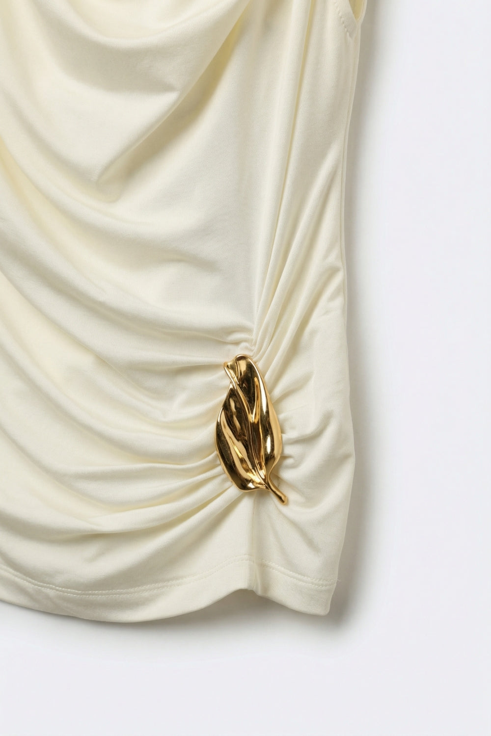 Cream Draped Sleeveless Top With gold Metal Decor