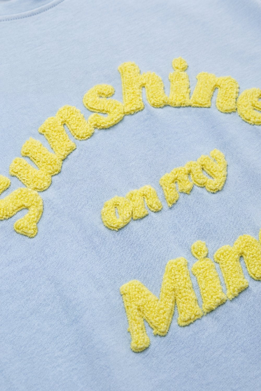 Light Blue Relaxed Fit Tee with Yellow Lettering - top