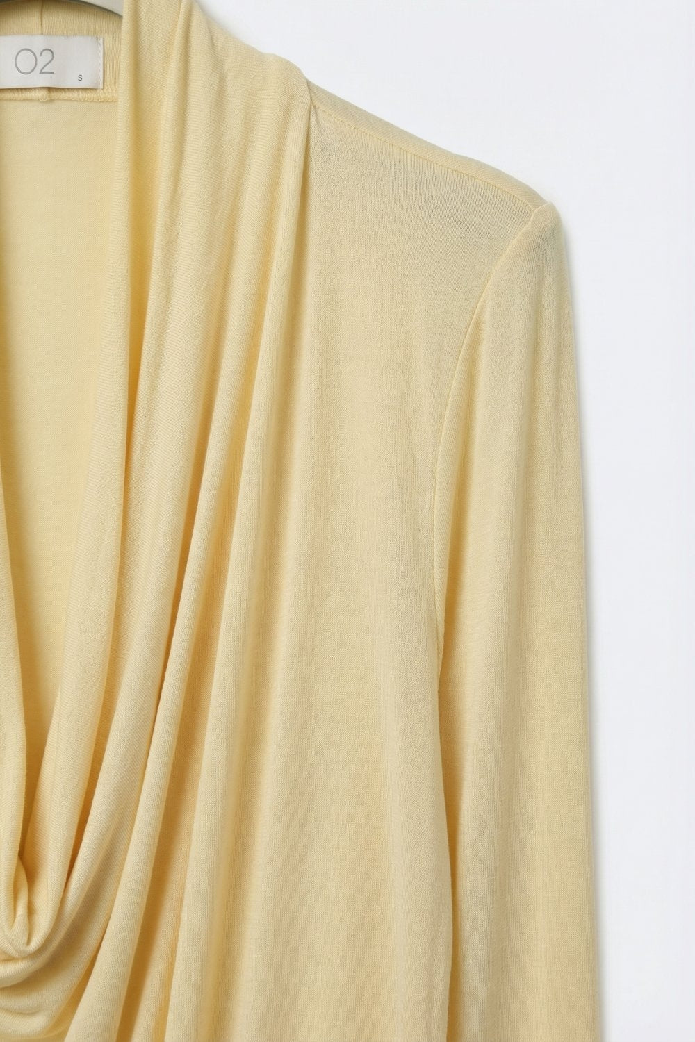 butter yellow front draped top with 3/4 sleeve