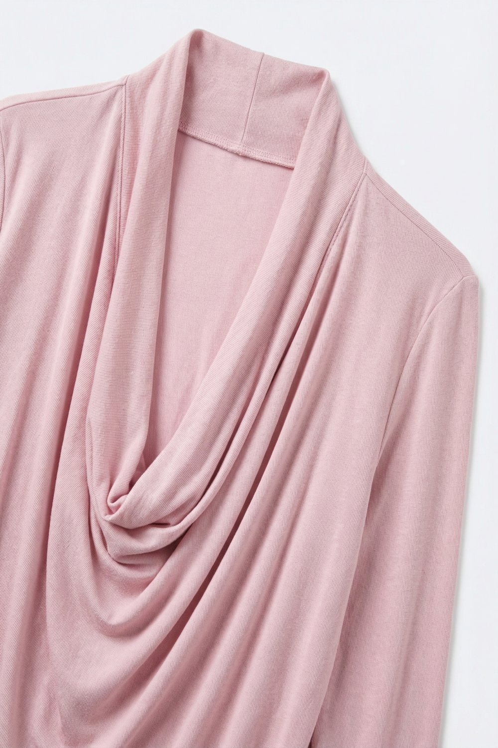 Pink three-quarter sleeve top with front draping and lightweight fabric