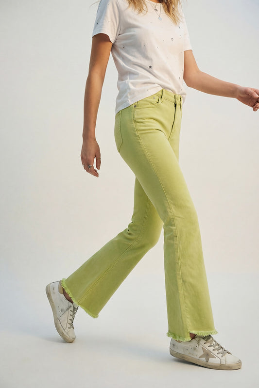 Flare jeans with raw hem edge in lime color - Coloured Jeans