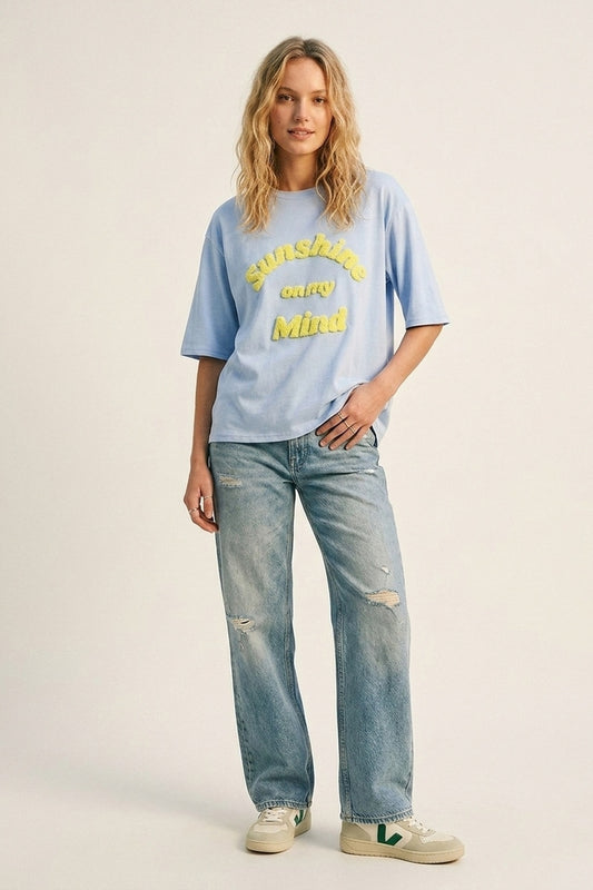 Light Blue Relaxed Fit Tee with Yellow Lettering - top