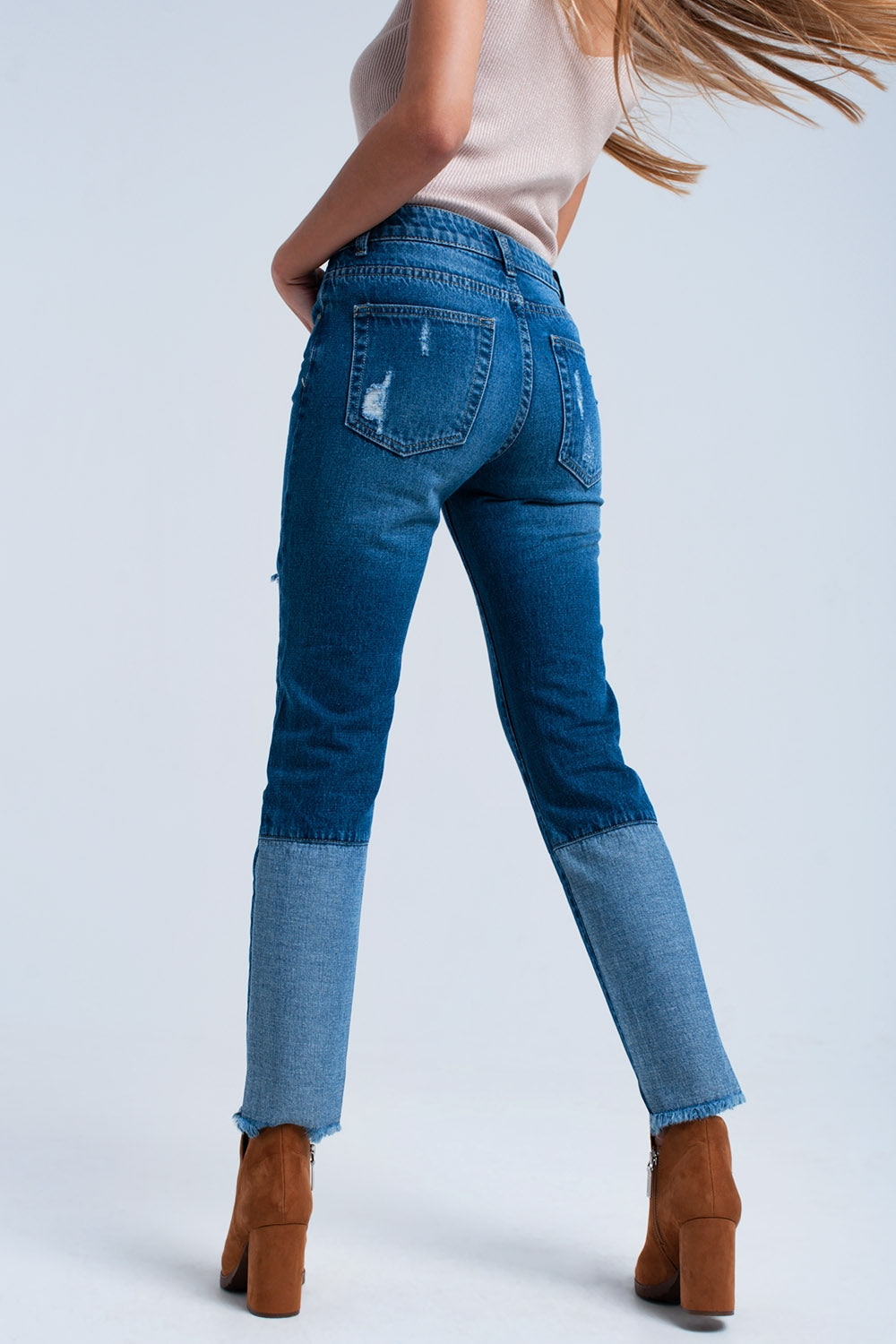 Worn straight jeans