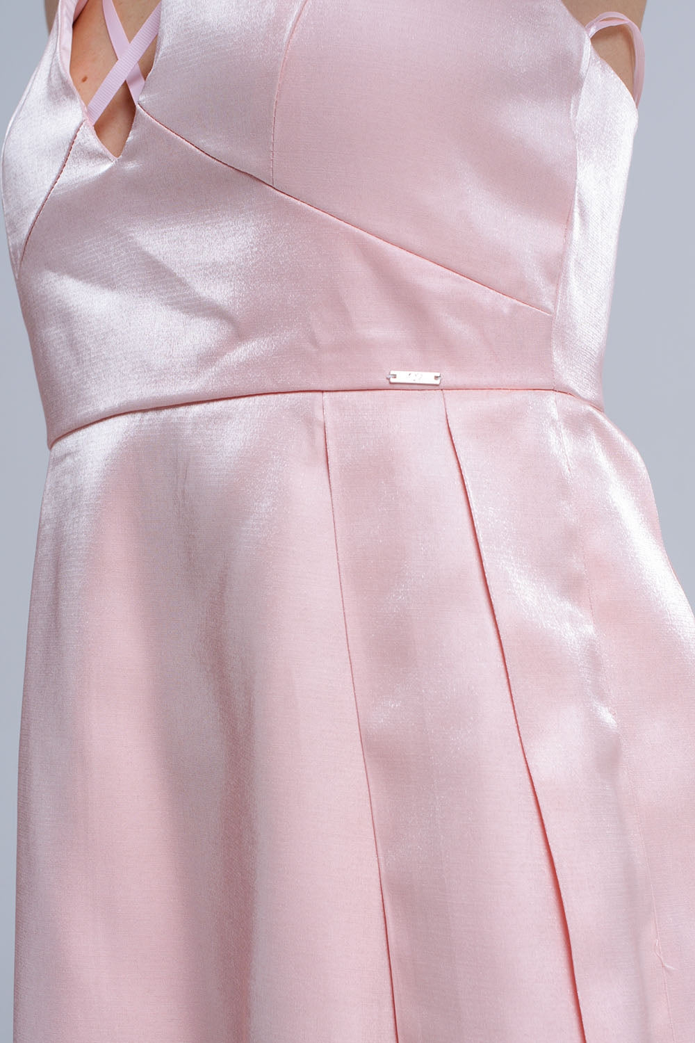 Pink dress with crossed ribbons