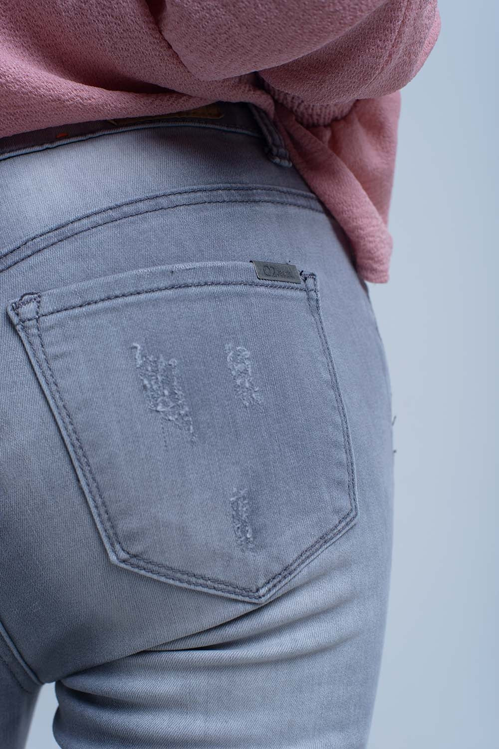Gray jeans with rips detail