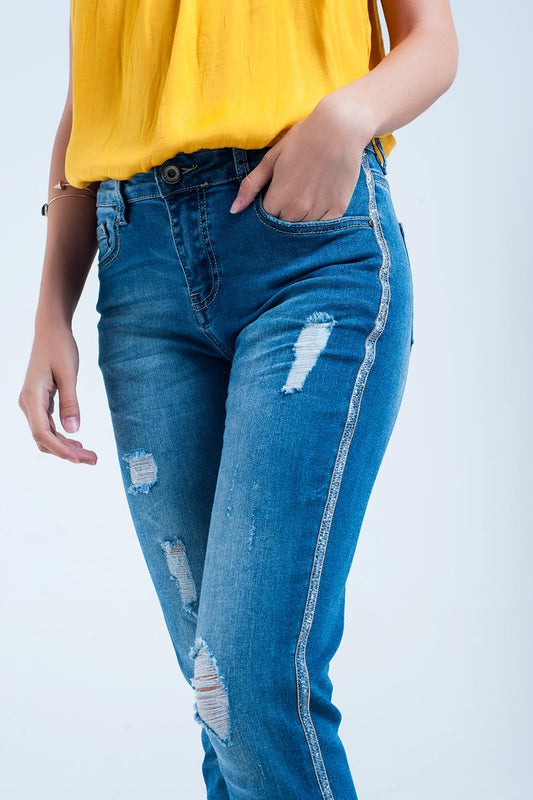 Skinny jeans with rips and glitter line - Denim