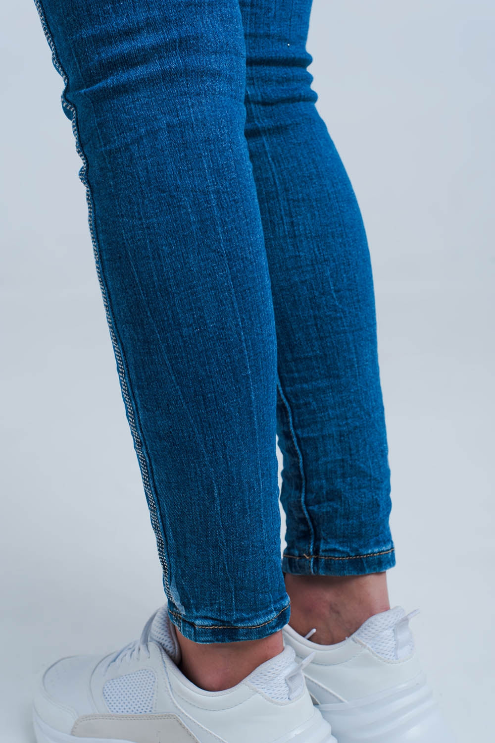 Mid wash jeans with glitter side stripe