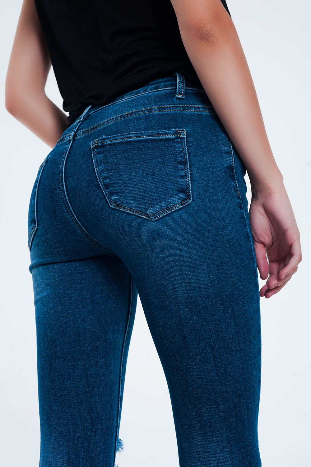 Distressed skinny fit jeans in mid wash