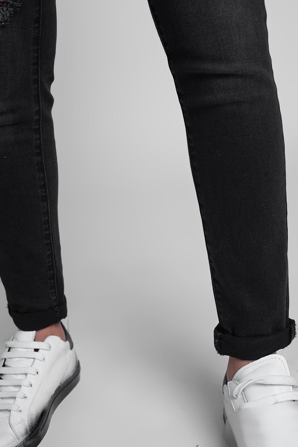 Skinny ripped jeans in washed black