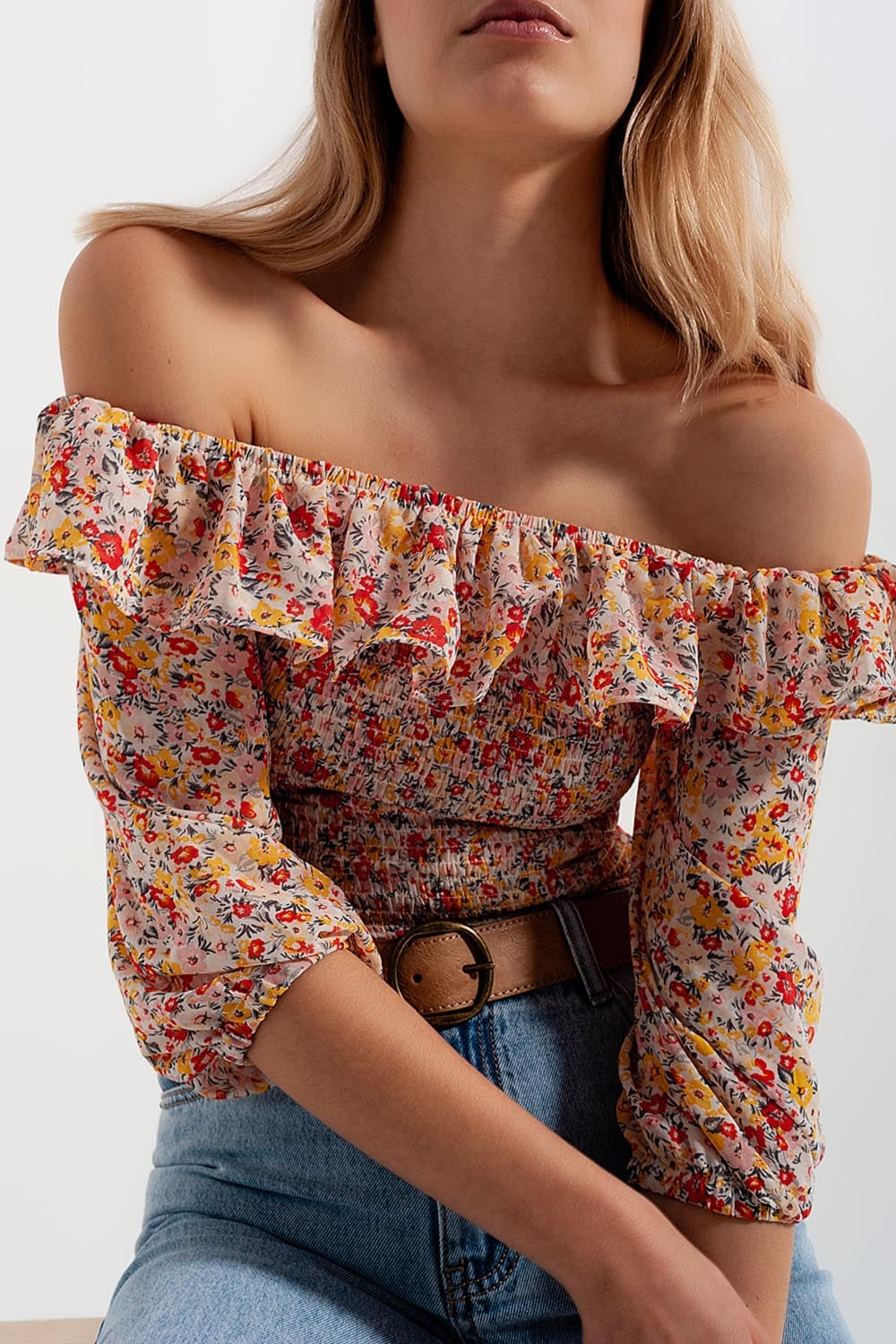 Shirred off the shoulder top with ruffle in coral floral print