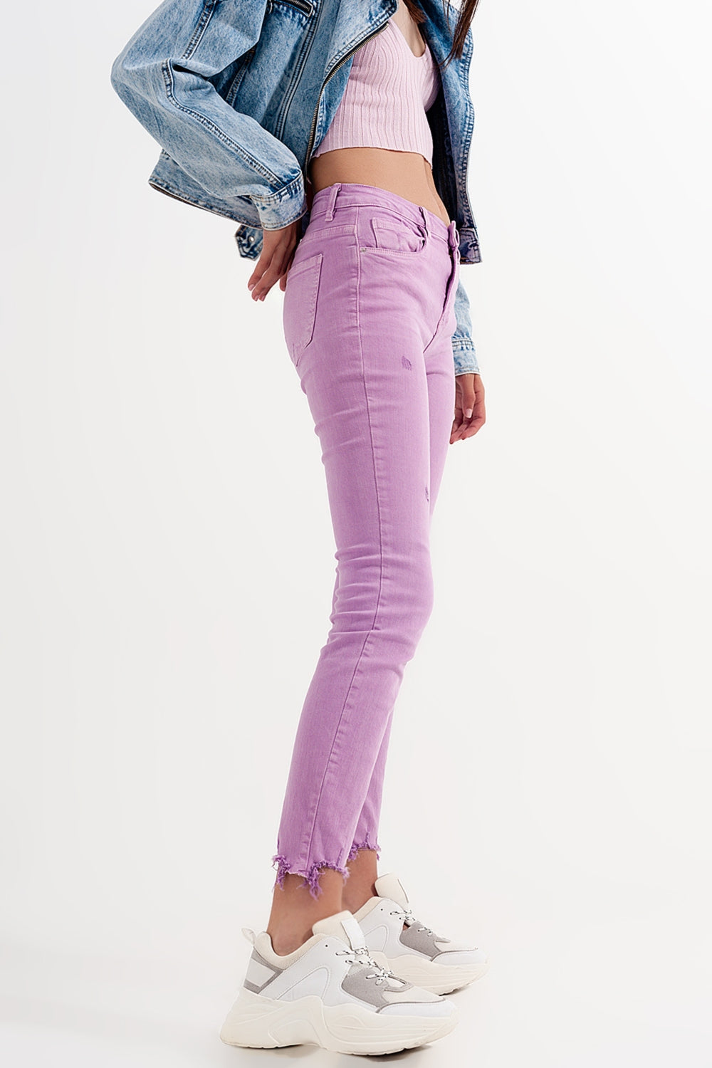 Distressed raw hem skinny jeans in lilac