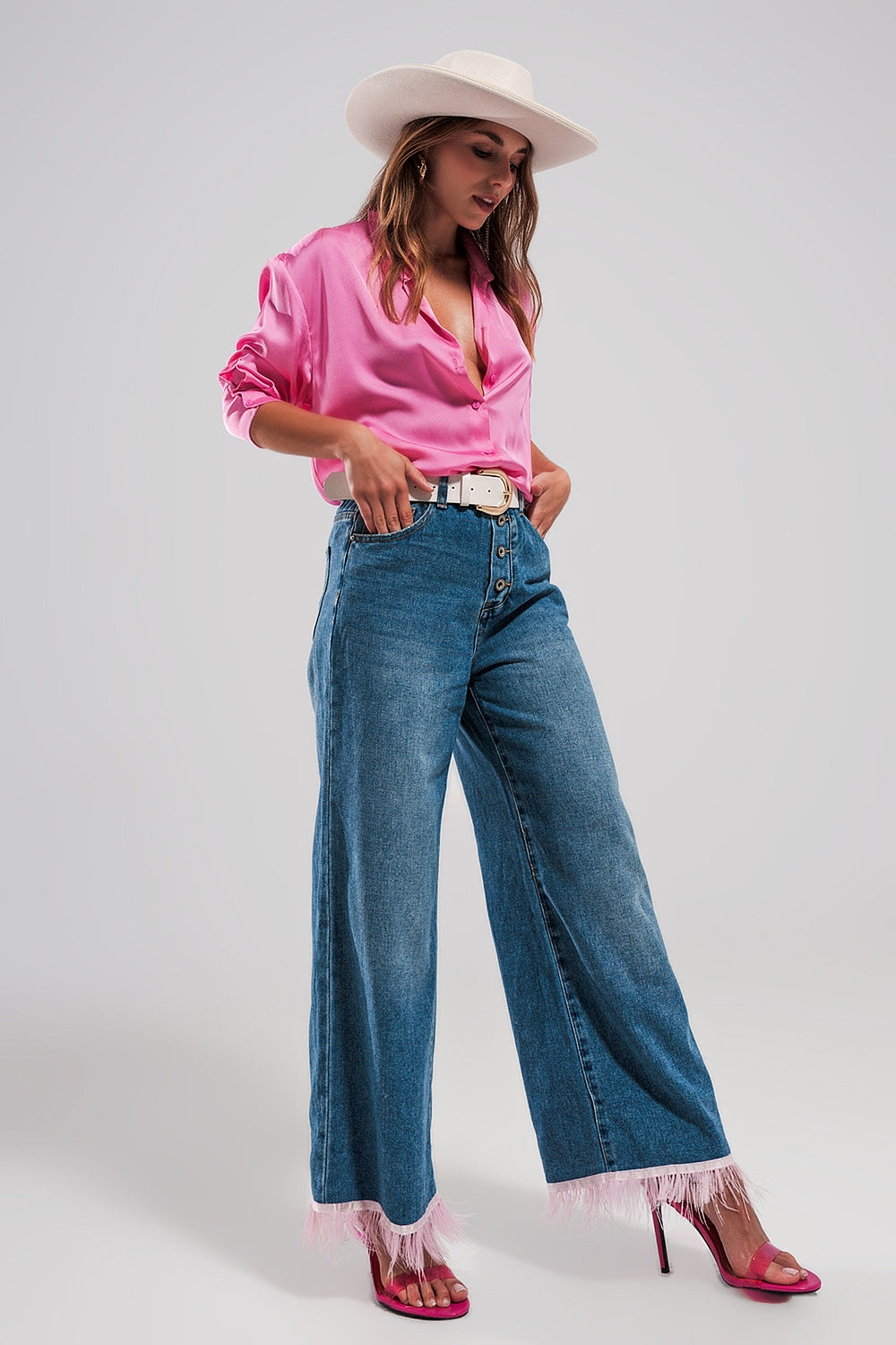 Straight leg jeans with PINK faux feather hem