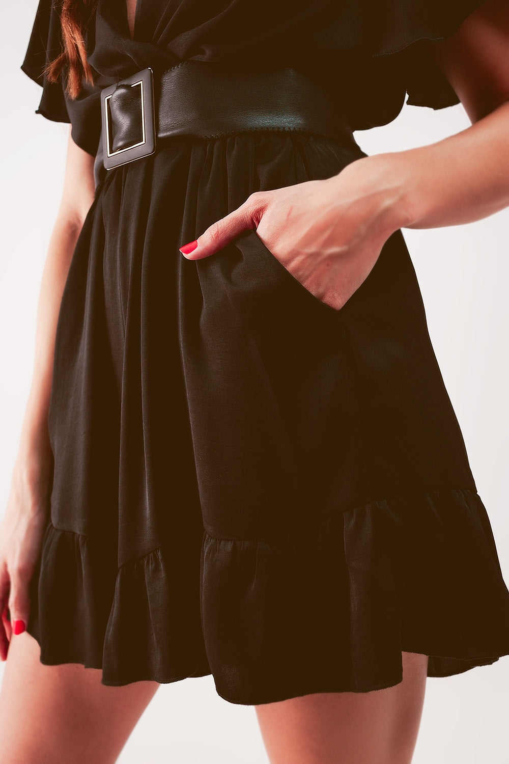 Wrap front frill hem jumpsuit in black
