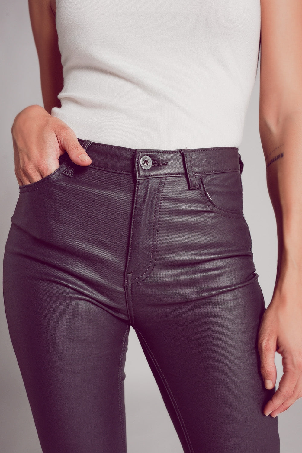 Stretch faux leather flare pants in grey - trousers
