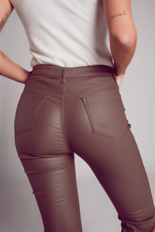 Stretch faux leather flare pants in beige - trousers