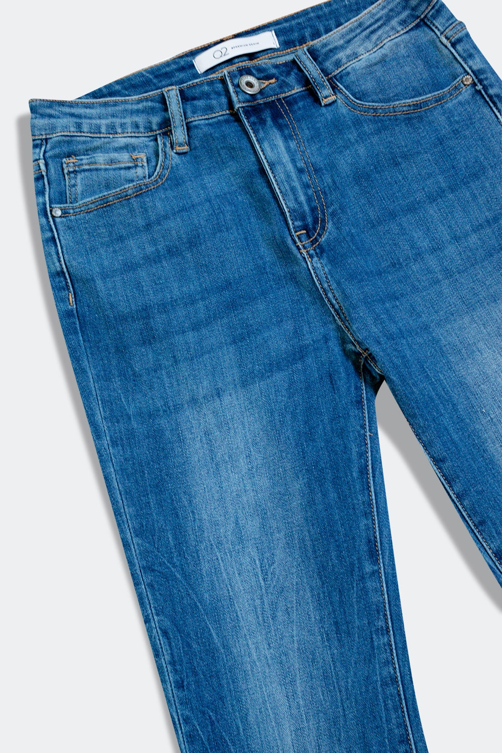 Flared jeans with raw edge in mid wash - Denim