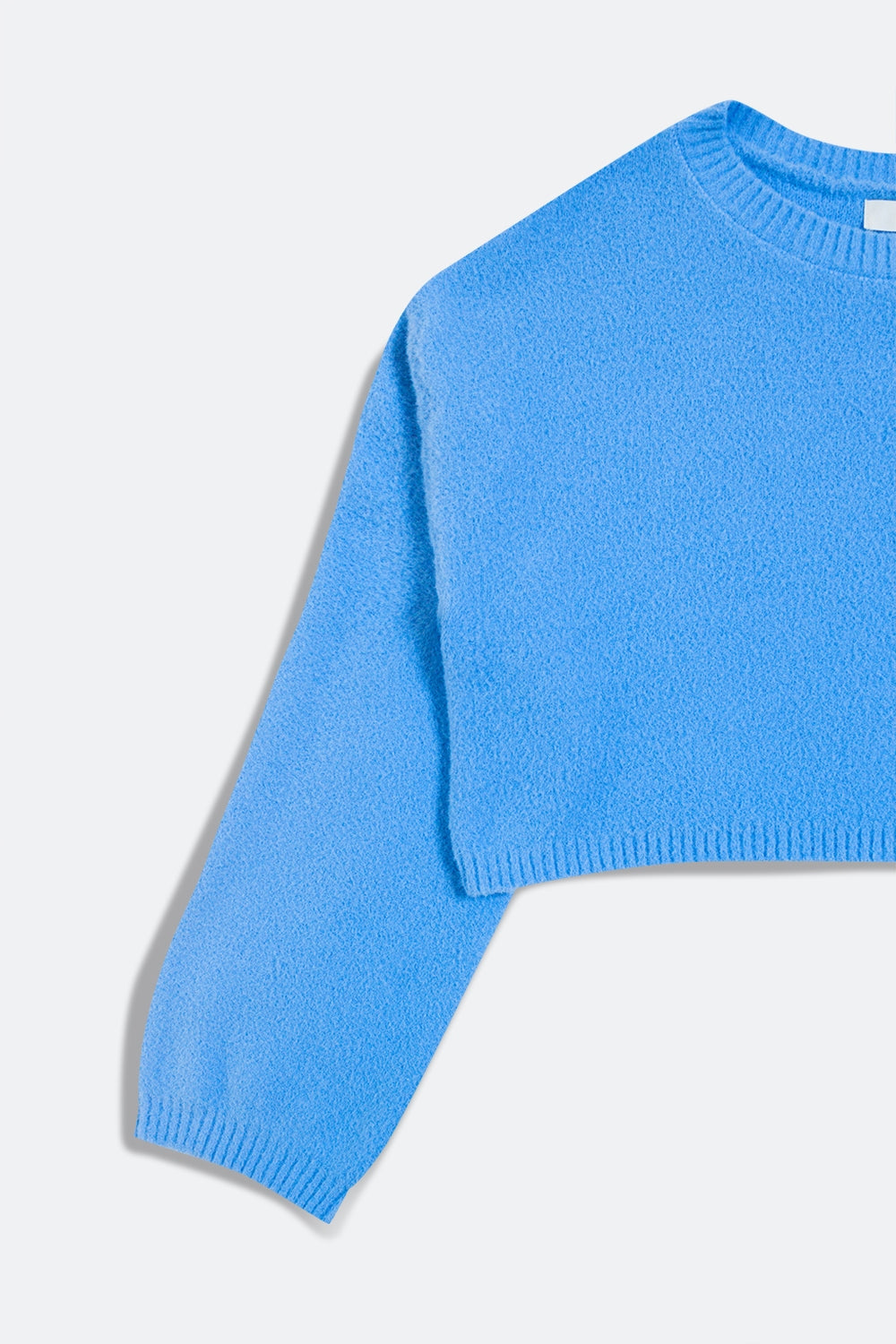 Fluffy cropped jumper in blue