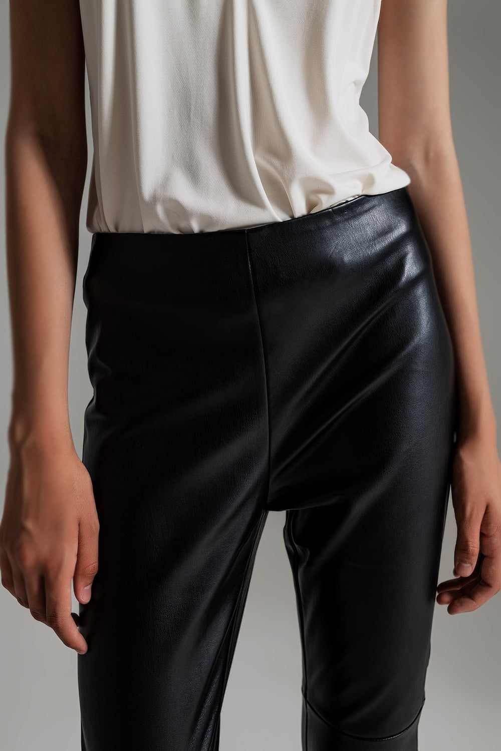 black faux leather effect skinny trousers