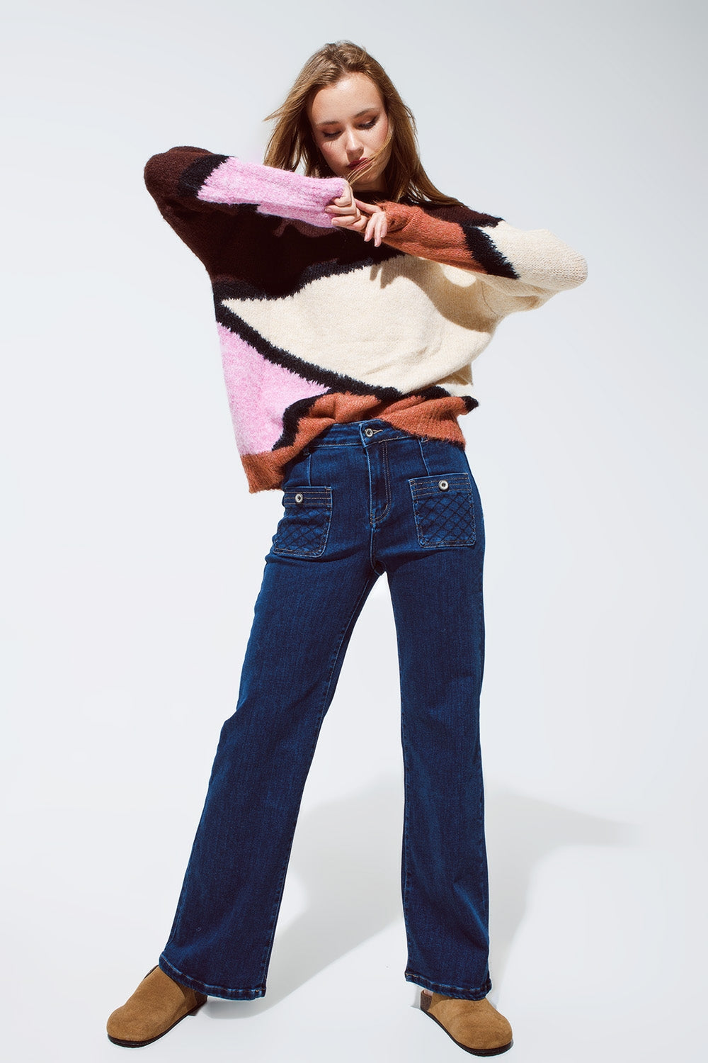 Blue jeans with buttoned pocket details in dark wash - Denim