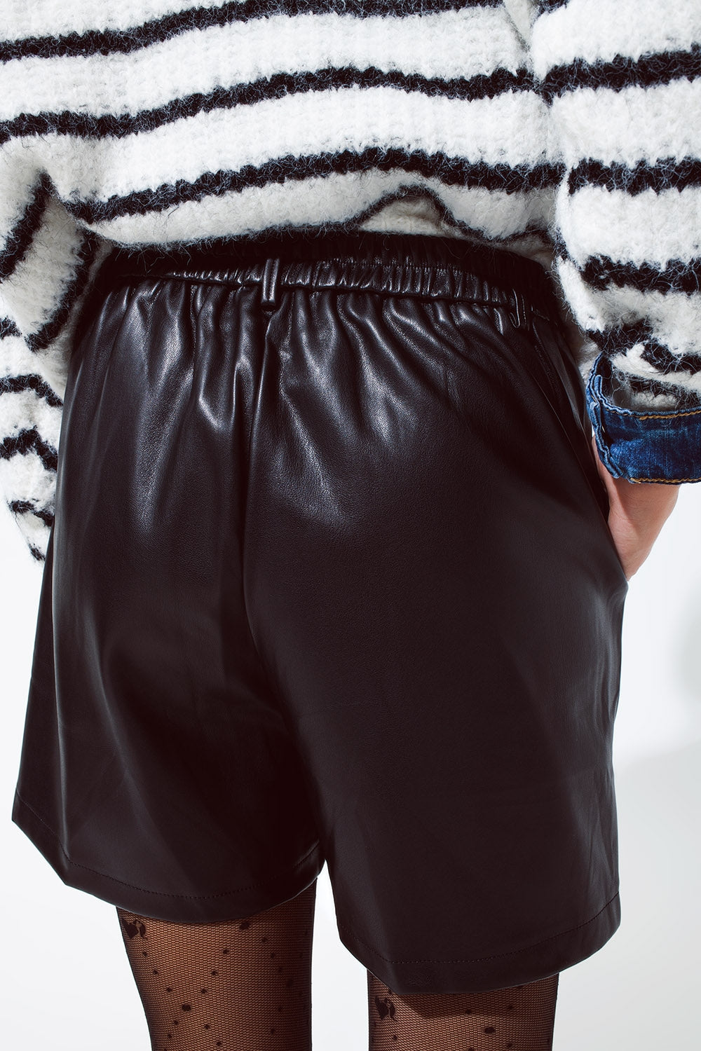 Faux leather oversized shorts with pleat down the front and pockets in black - trousers