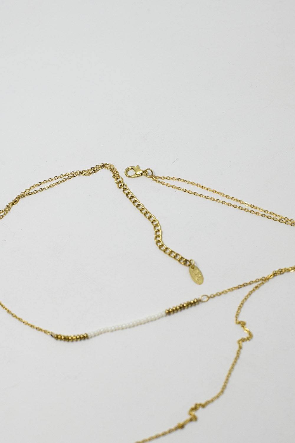 Long 2 in 1 gold necklace with bead details