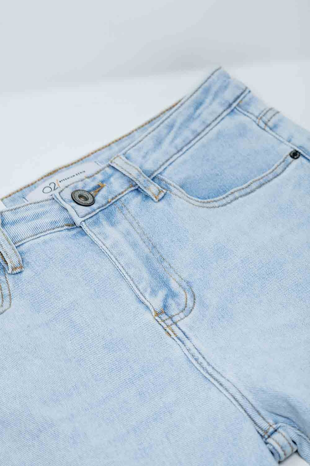 Flared light blue jeans with five pockets and seamless finish - Denim