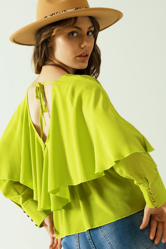 Green long sleeve top with a ruffle detail and bare back - top