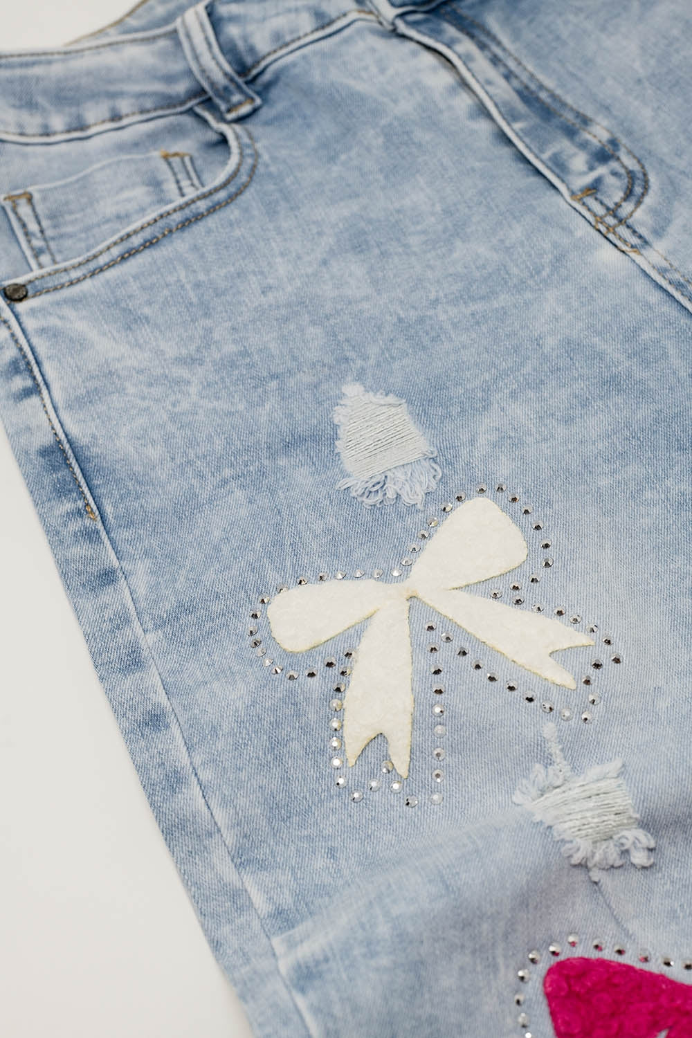 Light Blue Skinny Jeans With Bow ties and Ripped Holes - Denim