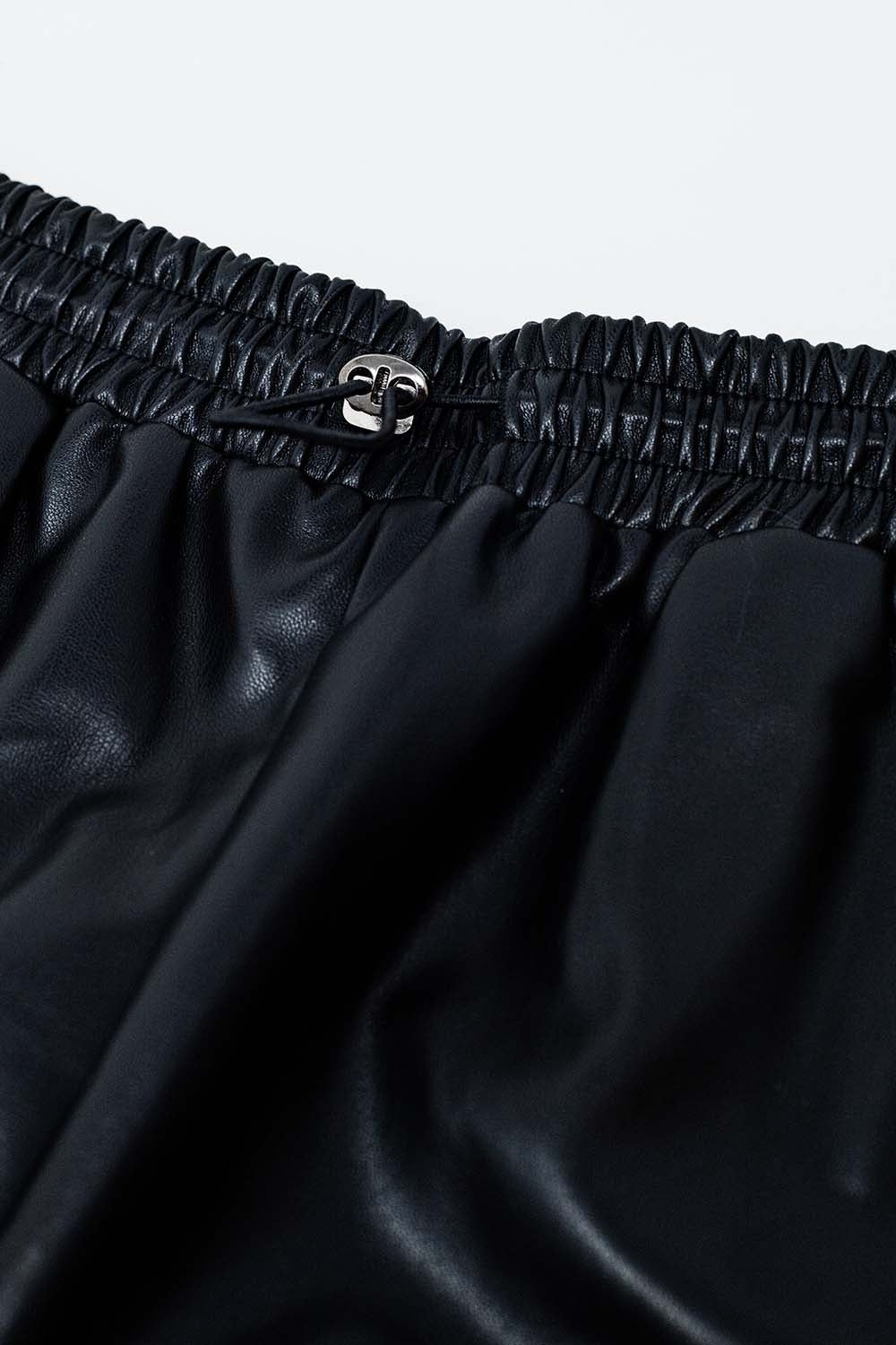 Black faux leather shorts with gathering at the waist with drawstring - trousers