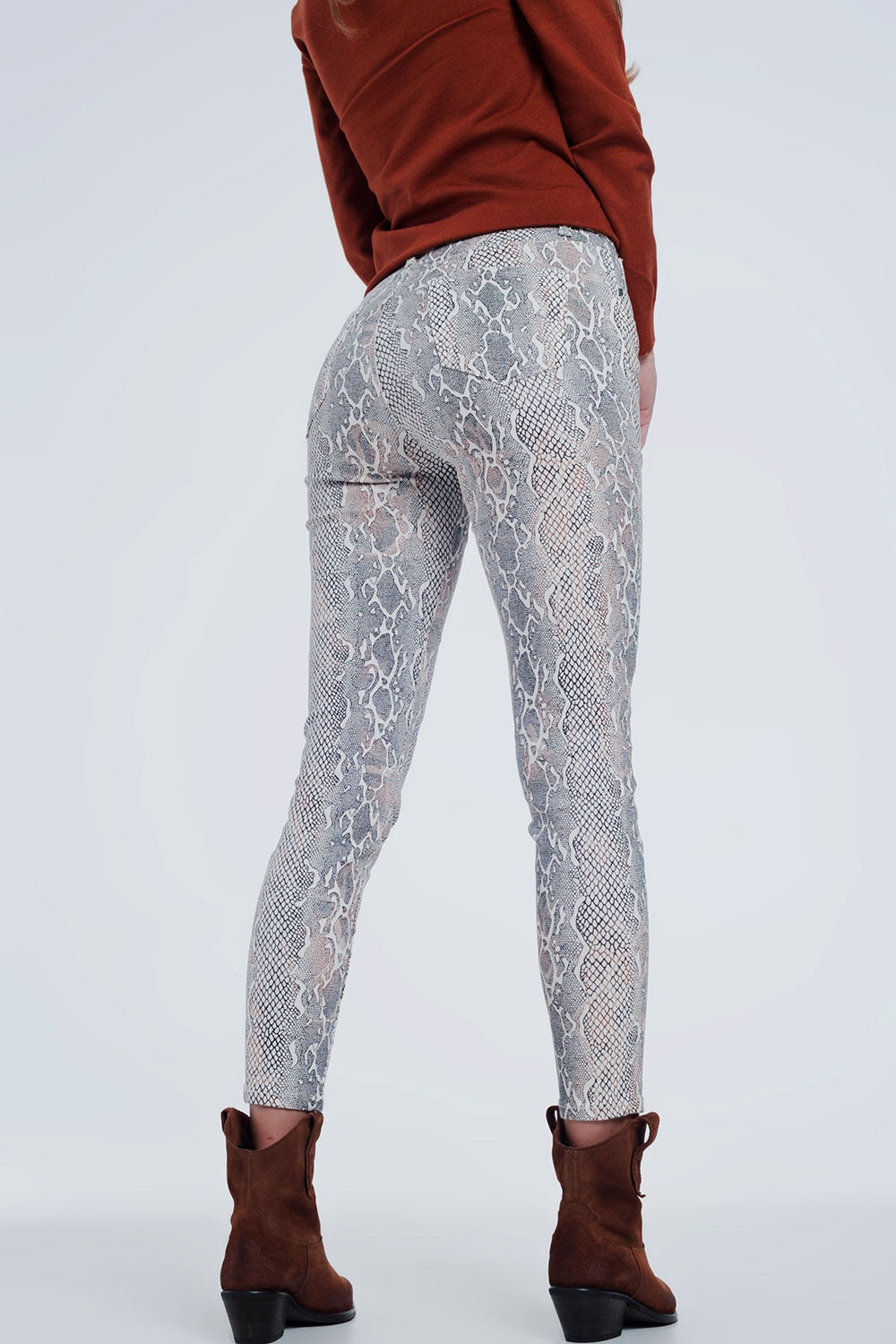 beige coloured pants with snake print - Trousers