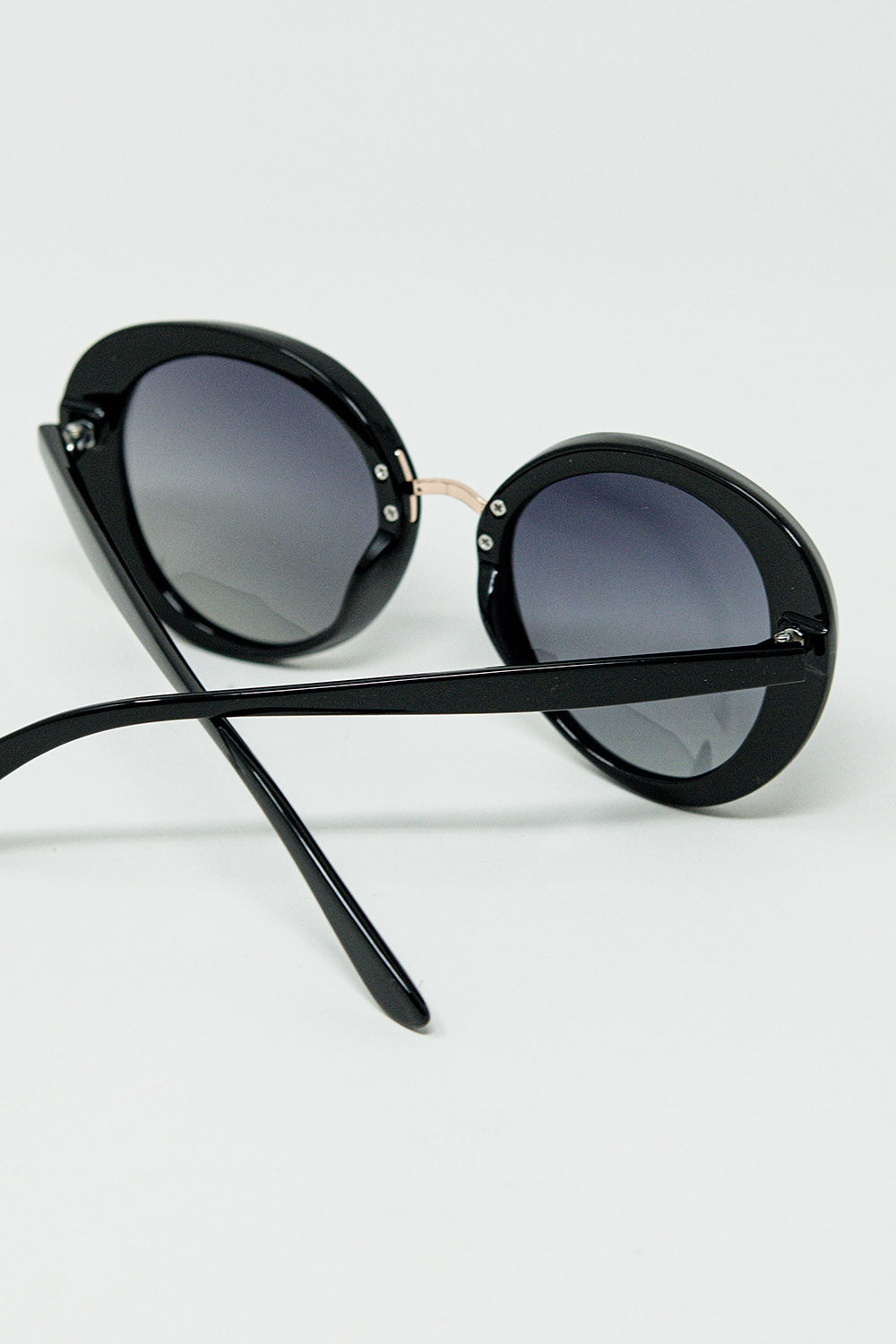 Black Oval Shaped Sunglasses with metal gold detail - Sunglasses