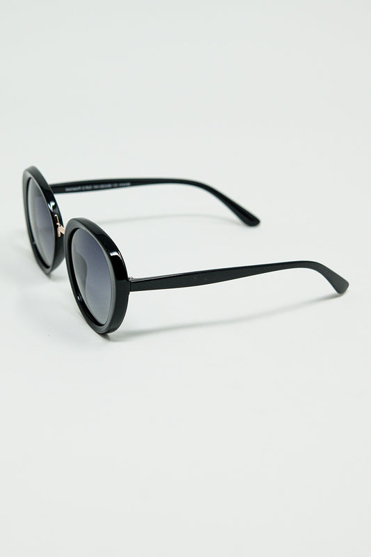 Black Oval Shaped Sunglasses with metal gold detail - Sunglasses
