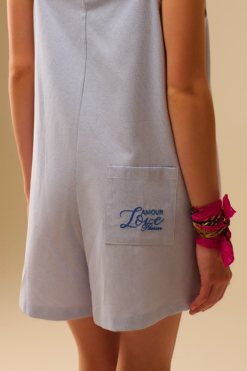 blue striped playsuit with shoulder ties and back pocket detail - Dresses