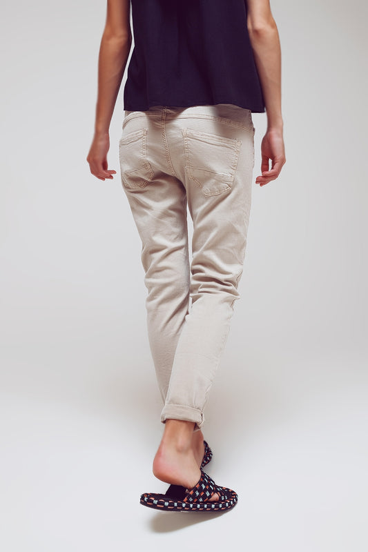 Exposed buttons skinny jeans in beige - Jeans
