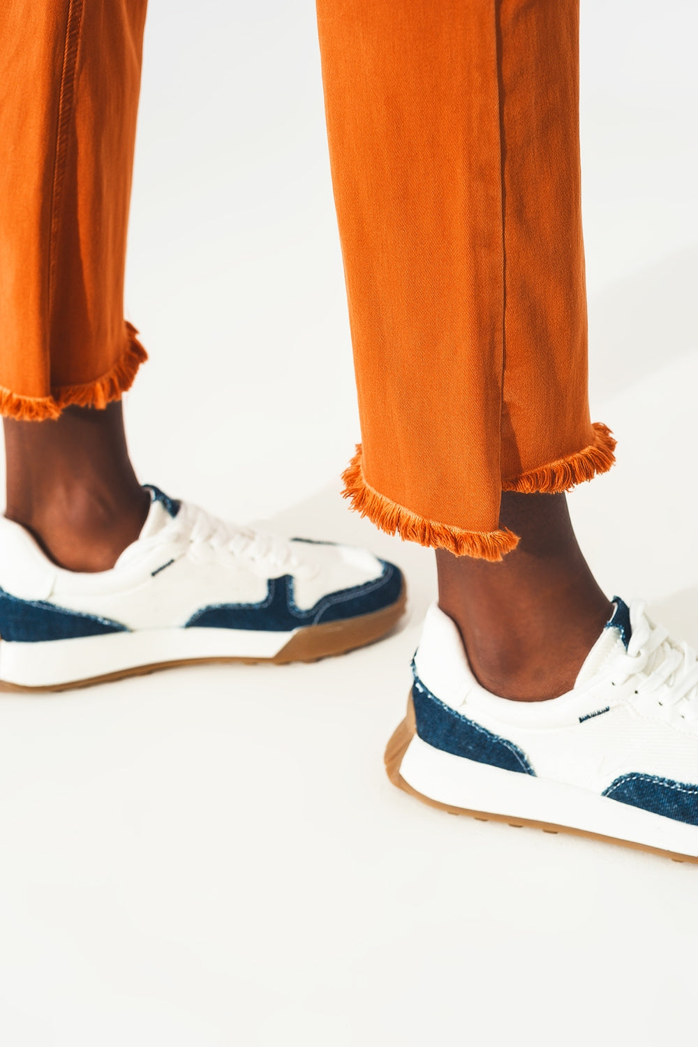 Flare jeans with raw hem edge in orange - Jeans