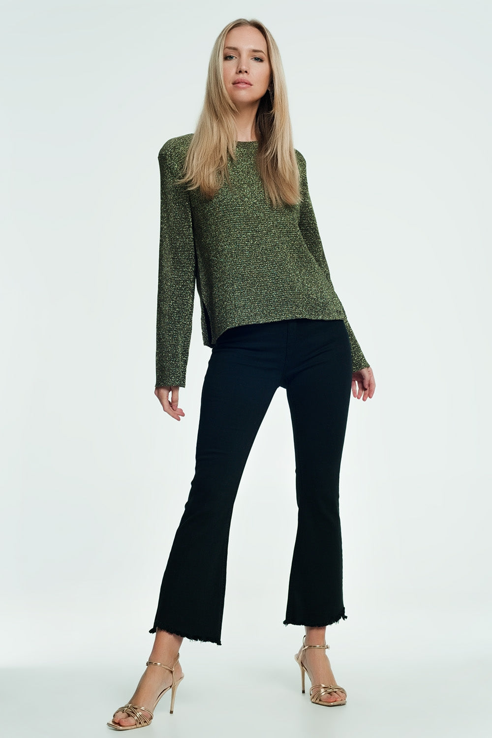 High rise raw hem flared jeans in black - Jeans