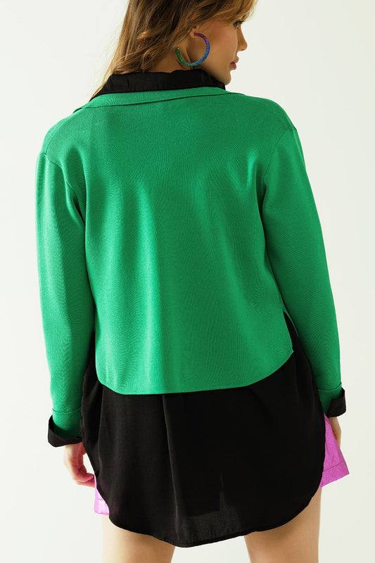 Knitted cardigan with chest pockes and golden buttons in green - Cardigans