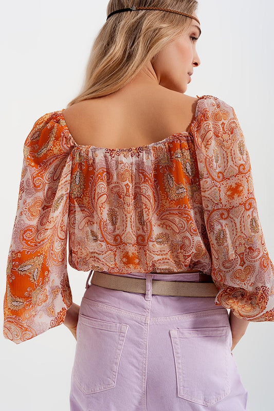 Long sleeve sheer top with shirred waist and tie detail in orange - Tops
