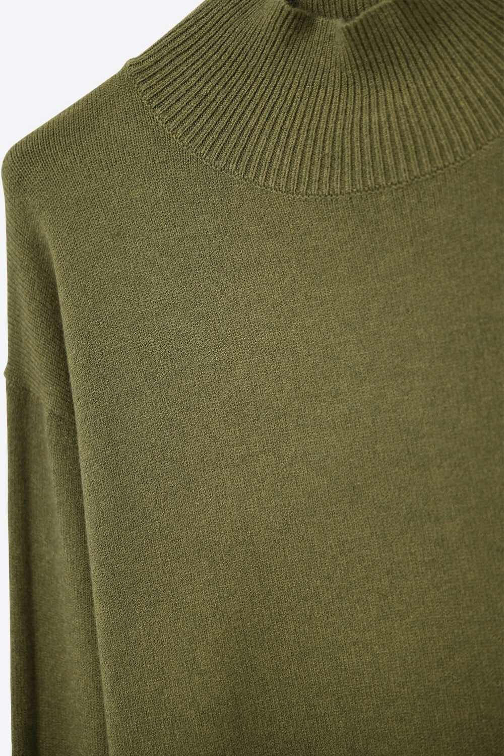 Loose military green sweater with open back detail -