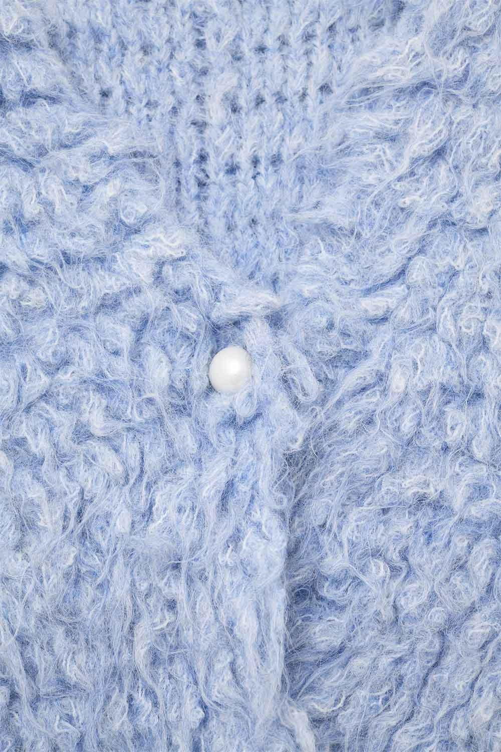 Luxurious vest with light blue long-haired texture -