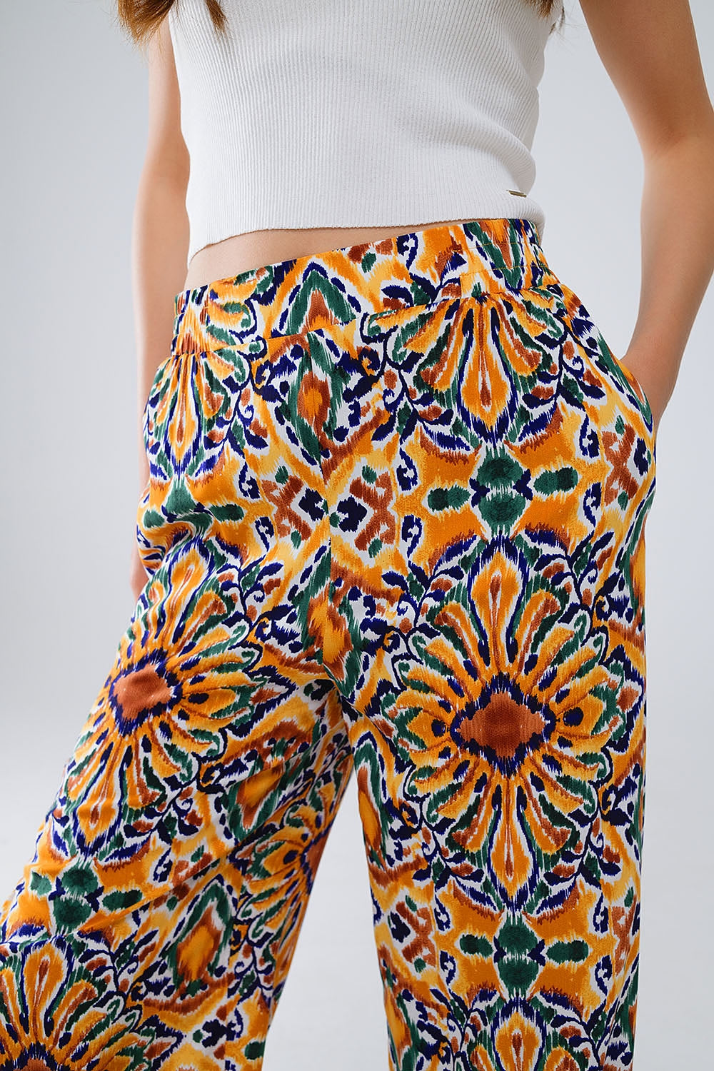 Multicolor Pants With Flower Print In Orange And Blue - Trousers